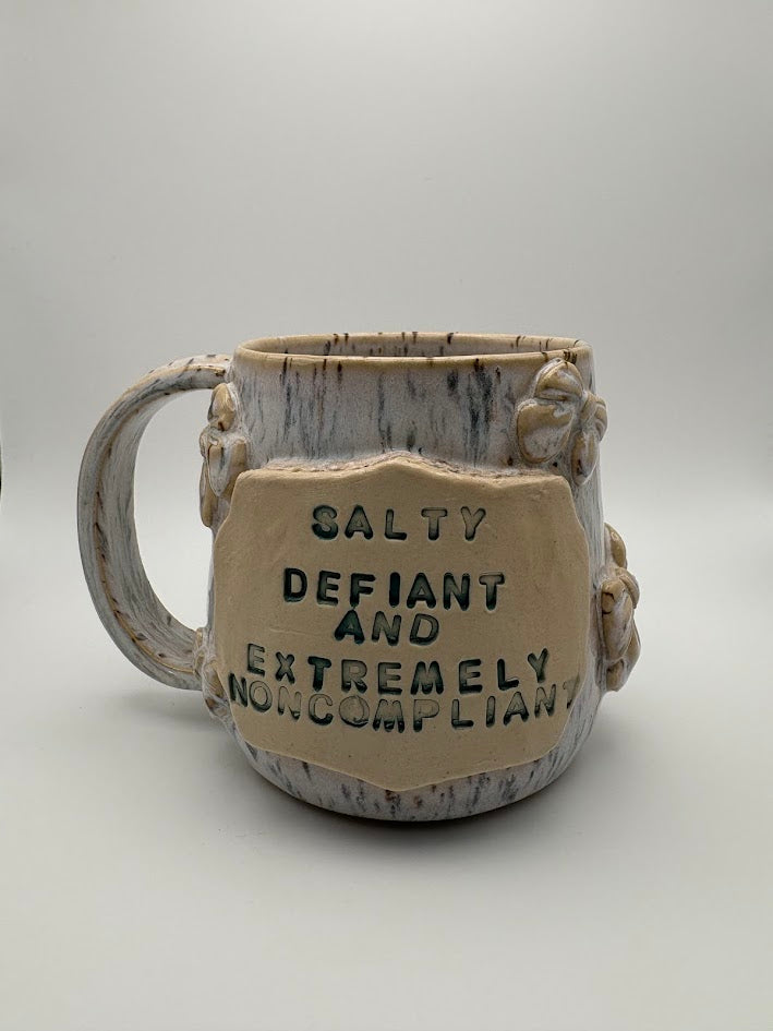 Spotted "Salty, Defiant, and Extremely Noncompliant" Bow Mug