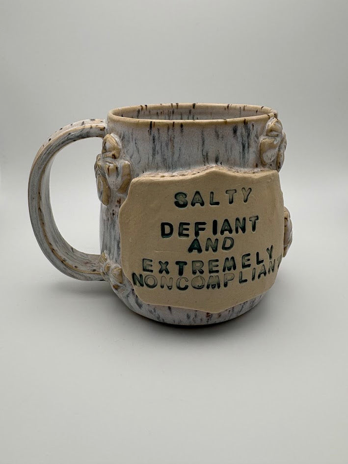 Spotted "Salty, Defiant, and Extremely Noncompliant" Bow Mug
