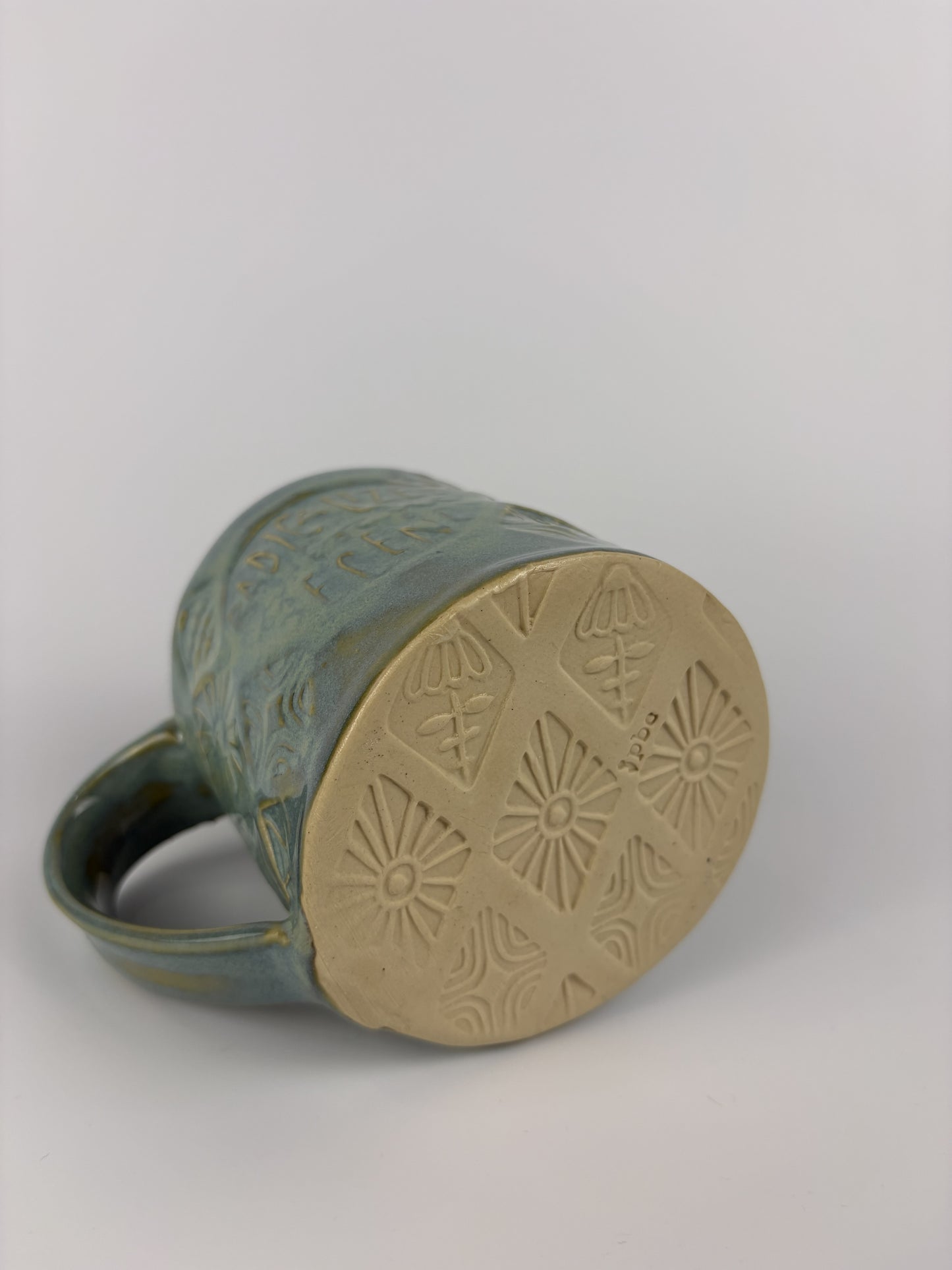 Turqoise "Radicalized by Basic Decency" Stamped Mug - Seconds
