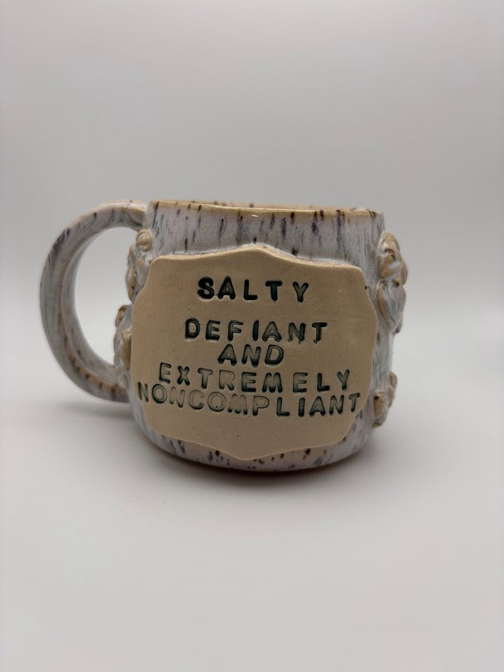 Spotted "Salty, Defiant, and Extremely Noncompliant" Bow Mug
